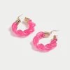 PINK OVERSIZED TWIST HOOP EARRINGS