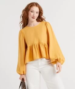 AMIRA LINEN PEPLUM TOP