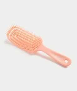 MANE ATTRACTION - PEACH FLEXI DETANGLING HAIR BRUSH