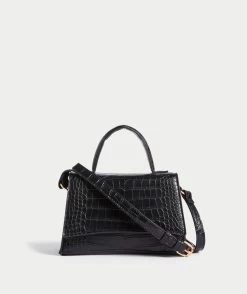 MACKENZIE BLACK CURVED CROSSBODY BAG